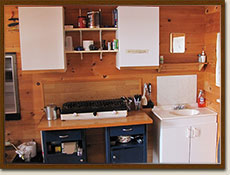 Wapesi Lake North - one person cabin kitchen