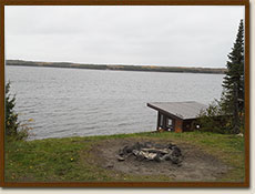 Firepit and lookingoff at Wapesi Lake North Outpost