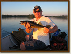 Early morning fishing on Wapesi Lake in Northern Ontario Canada